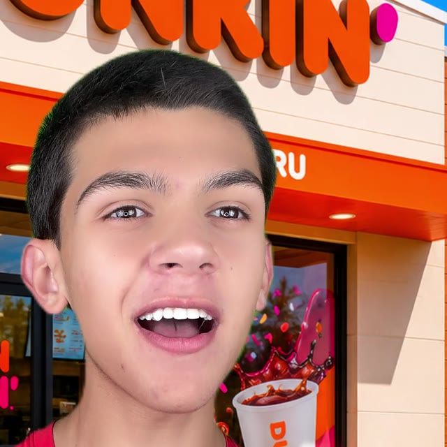 Julian in front of a Dunkin’